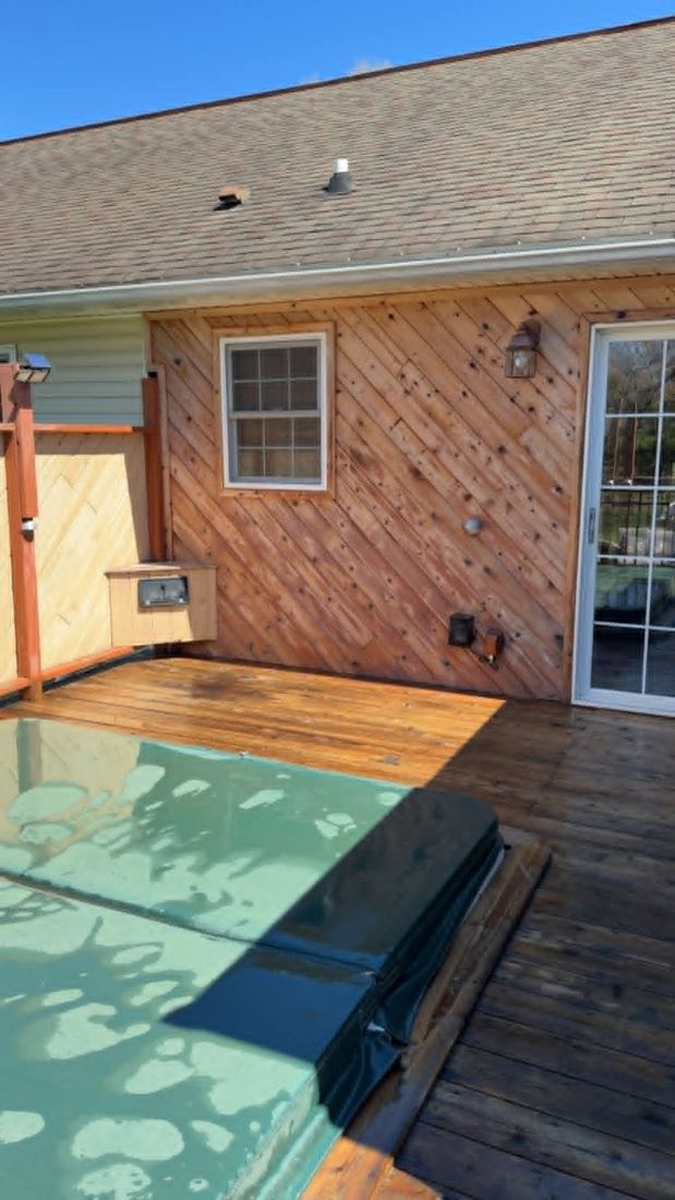 Restored warm wood wall and deck after