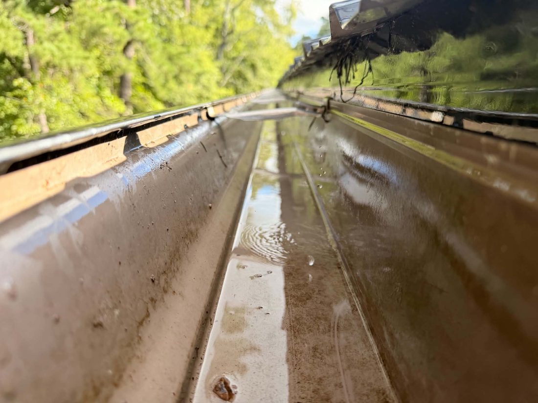 Clear gutter draining freely after cleaning