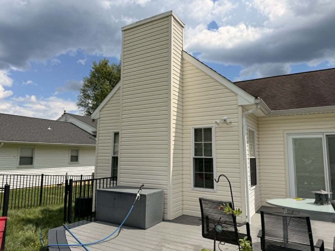 Same chimney and siding, clean