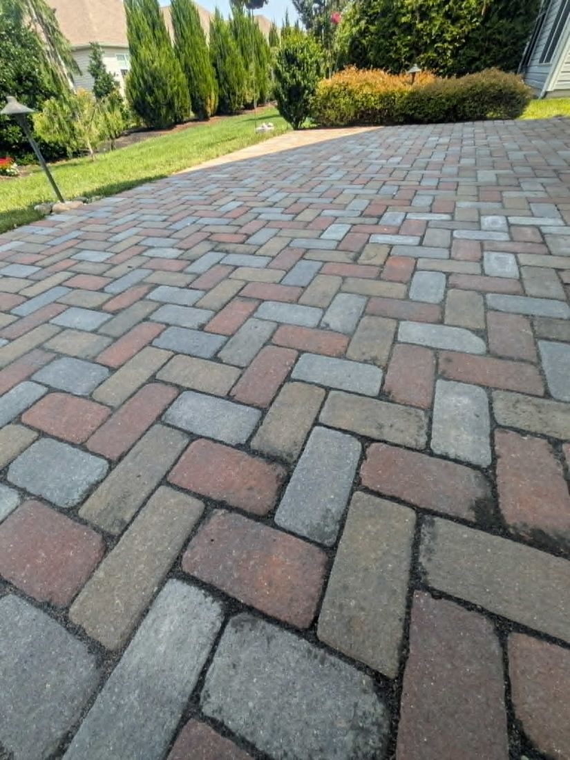 Dirty faded pavers before restoration