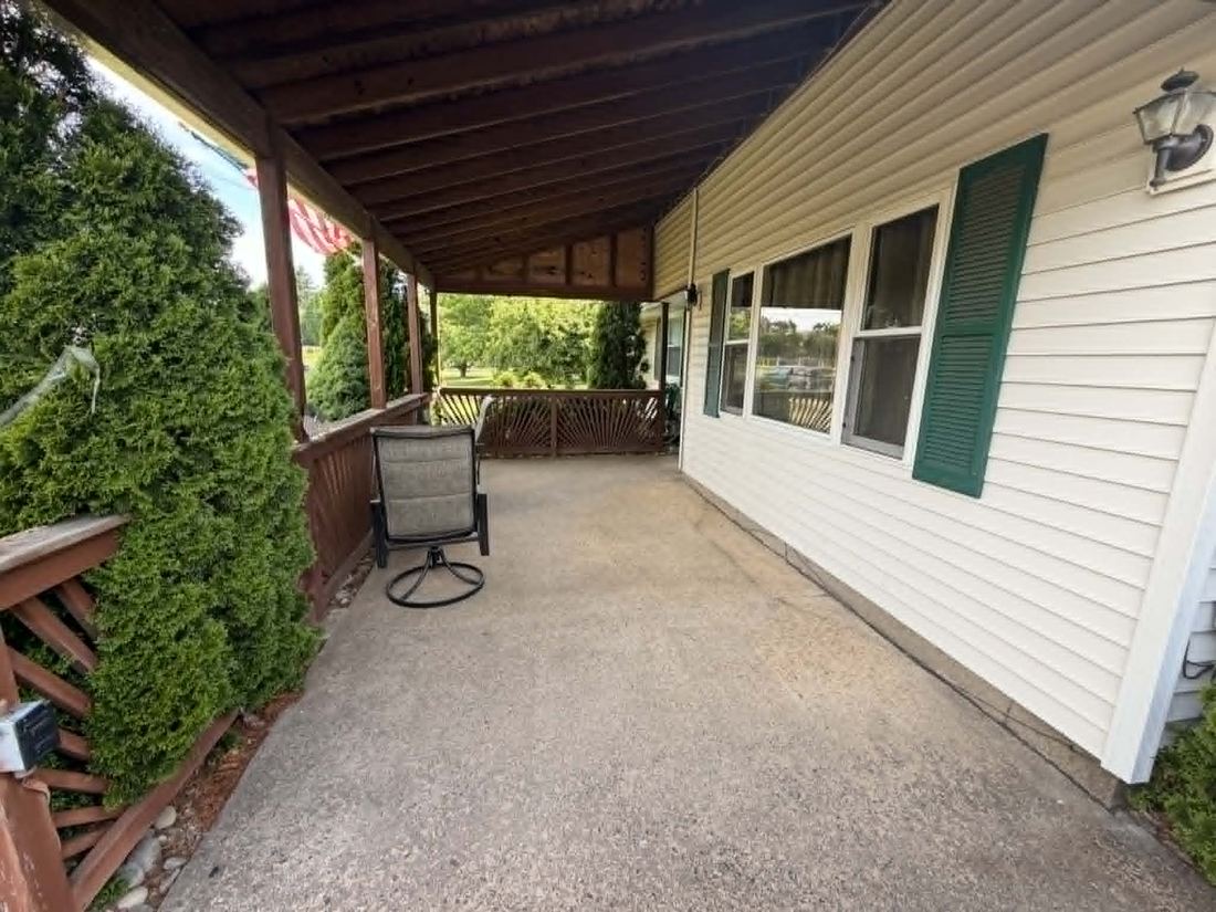 Covered patio before cleaning