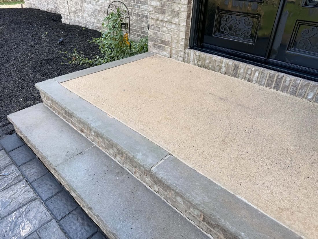 Front steps cleaned back to bare concrete